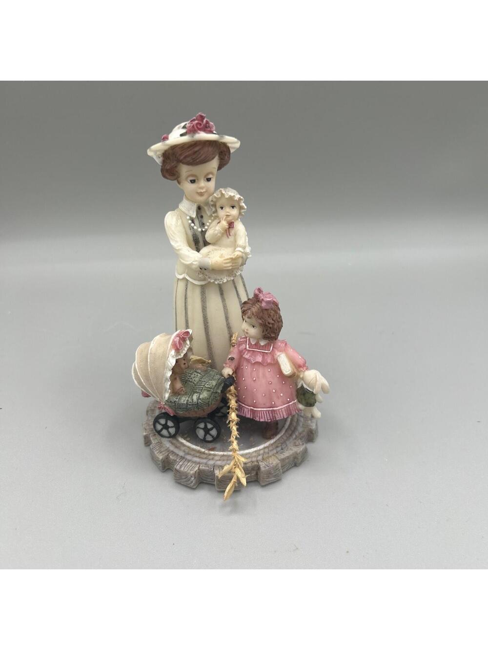 THE GRAND COLLECTION FIGURINES A Mother’s Love Musical Number 98836